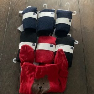 Baby Gap girls tights (7) pairs, 3 blue, 2 black, 2 red Sz 2-3 years. NWT